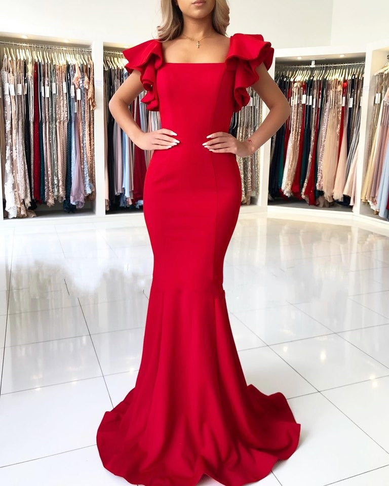 red prom dress square neck Stacees red prom dress with a flattering square neckline and elegant draped side