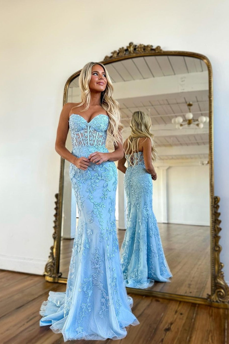 Prom Dress: Baby Blue Ball Gown adorned with Mermaid Appliques