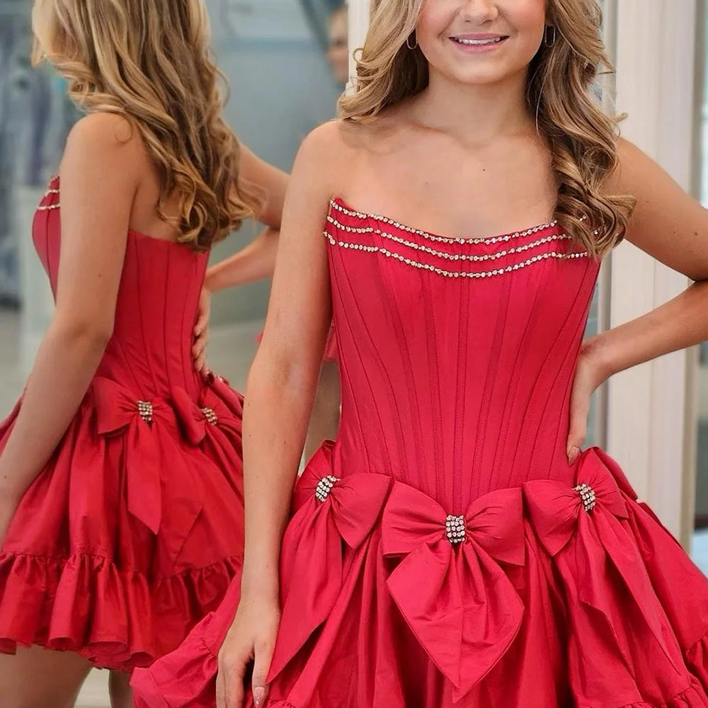 
                  
                     A Line Black Strapless Corset Ruffled Short Homecoming Dress With Bows
                  
                