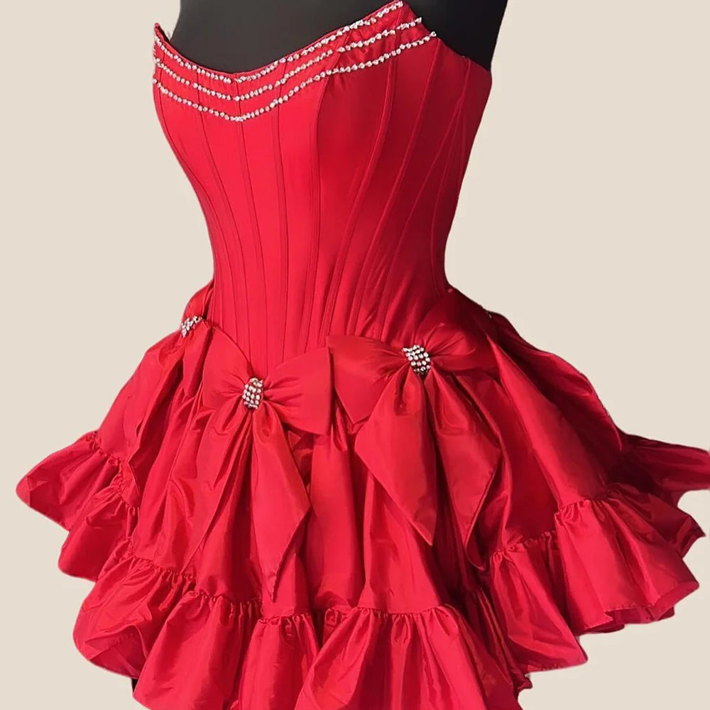 
                  
                     A Line Black Strapless Corset Ruffled Short Homecoming Dress With Bows
                  
                
