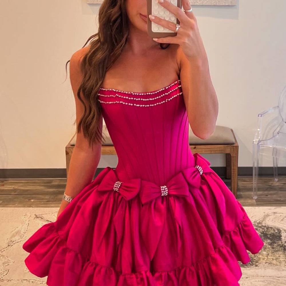 
                  
                     A Line Black Strapless Corset Ruffled Short Homecoming Dress With Bows
                  
                