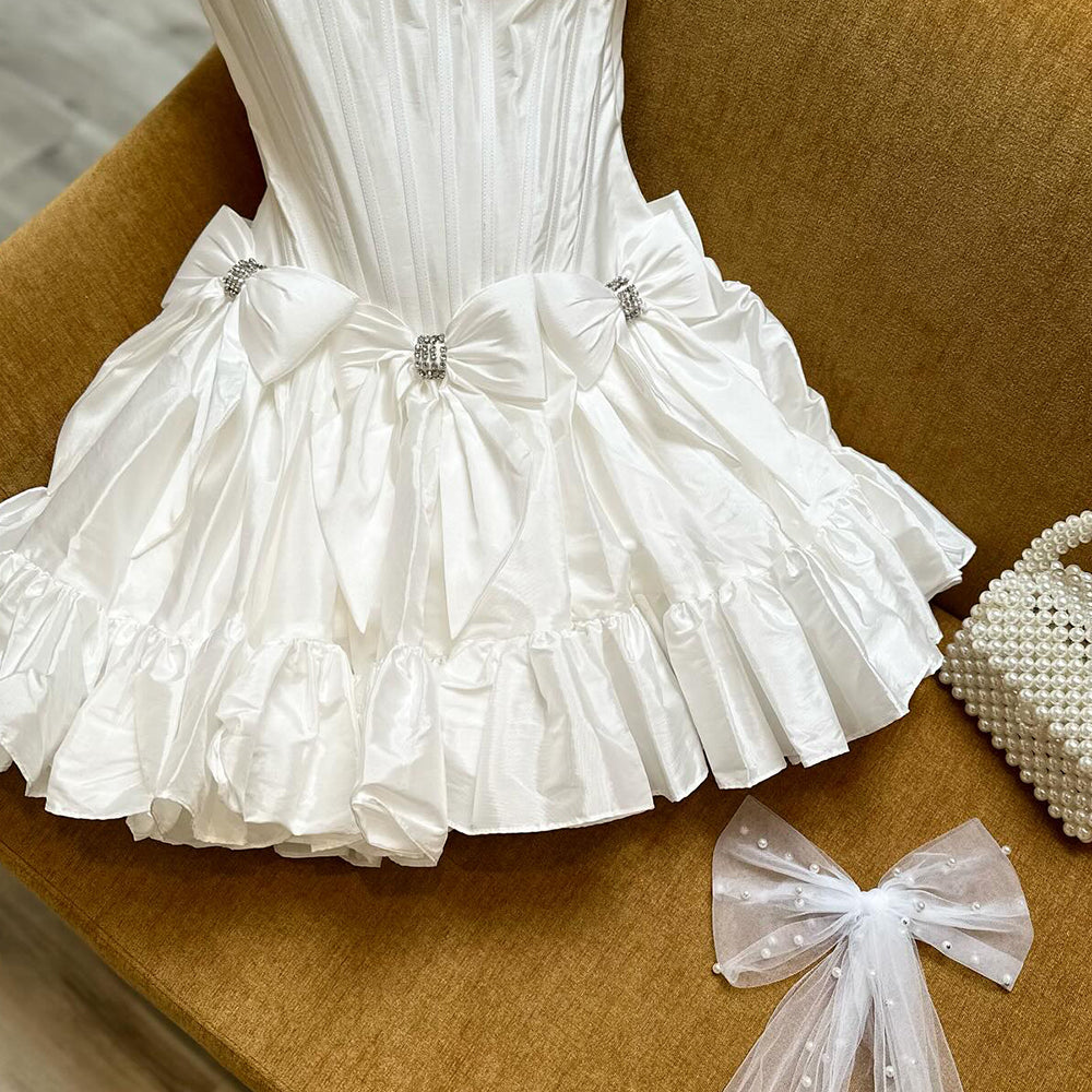 
                  
                     A Line Fuchsia Strapless Corset Short Homecoming Dress With Bow
                  
                