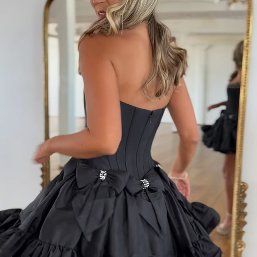 
                  
                     A Line Fuchsia Strapless Corset Short Homecoming Dress With Bow
                  
                