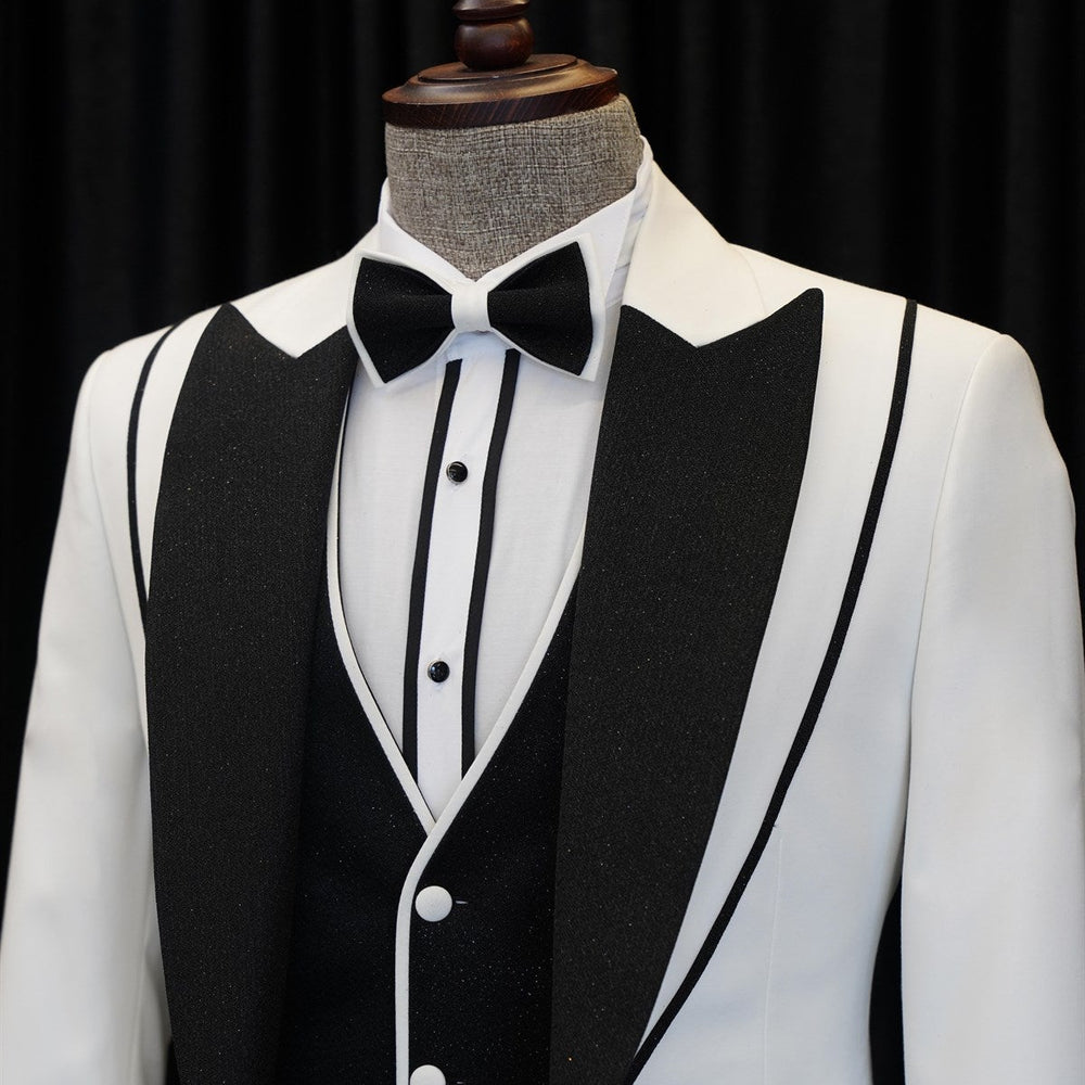 
                  
                    Abel Fashion White And Black Peaked Lapel Three Pieces Wedding Suits
                  
                