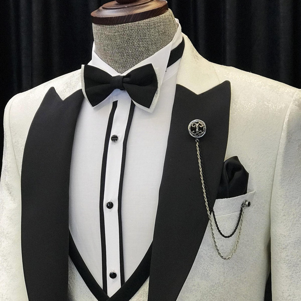 
                  
                    Alvin New Arrival White Jacquard Three Pieces Wedding Suits With Black Peaked Lapel
                  
                