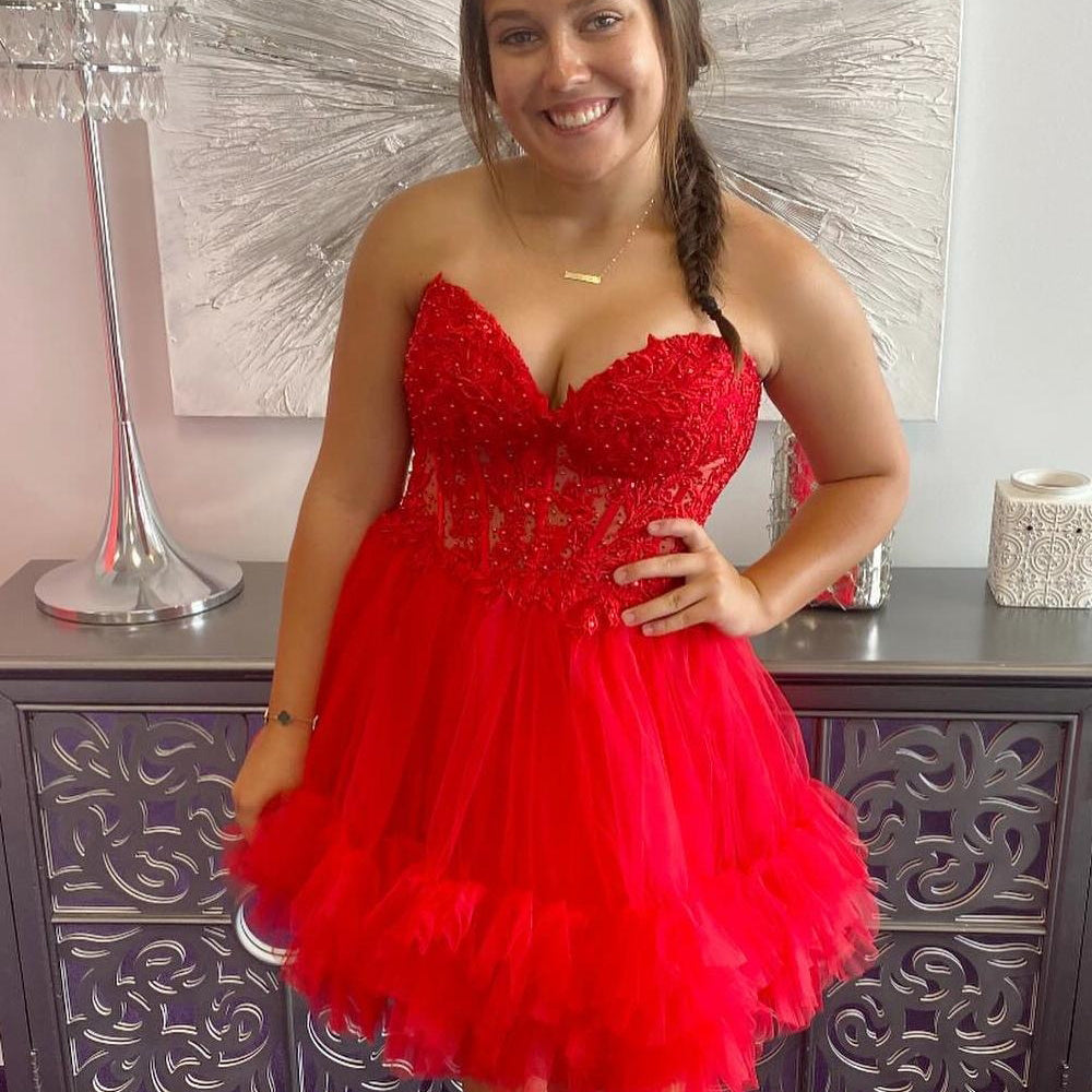 
                  
                    Cute Pink Strapless Corset A Line Tiered Short Homecoming Dress
                  
                