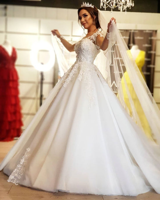 Luxury long sleeves a-line Off-the-shoulder Wedding dresses sequined main image 0