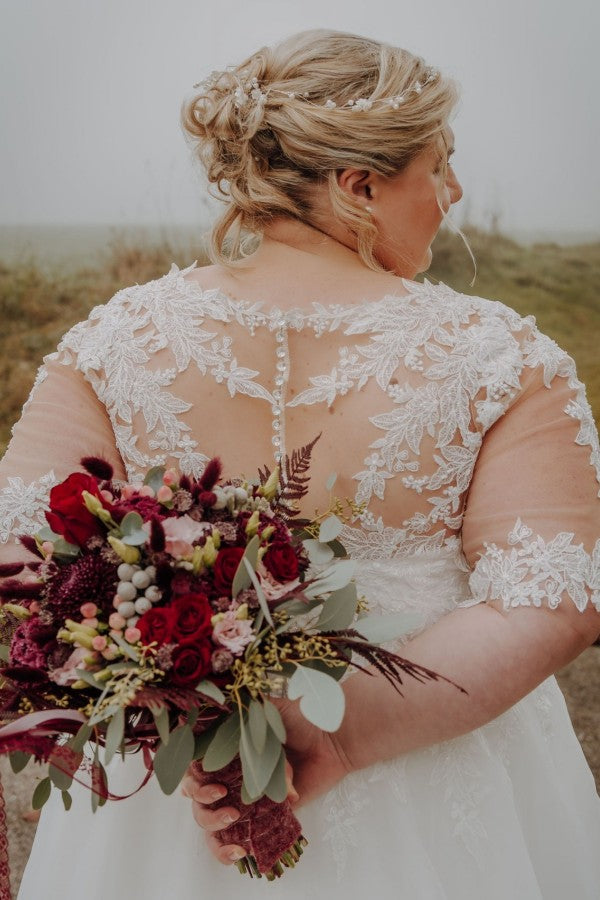 
                  
                    Biztunnel Half Sleeves Sweetheart Plus Size Wedding Dresses with Lace Applique
                  
                