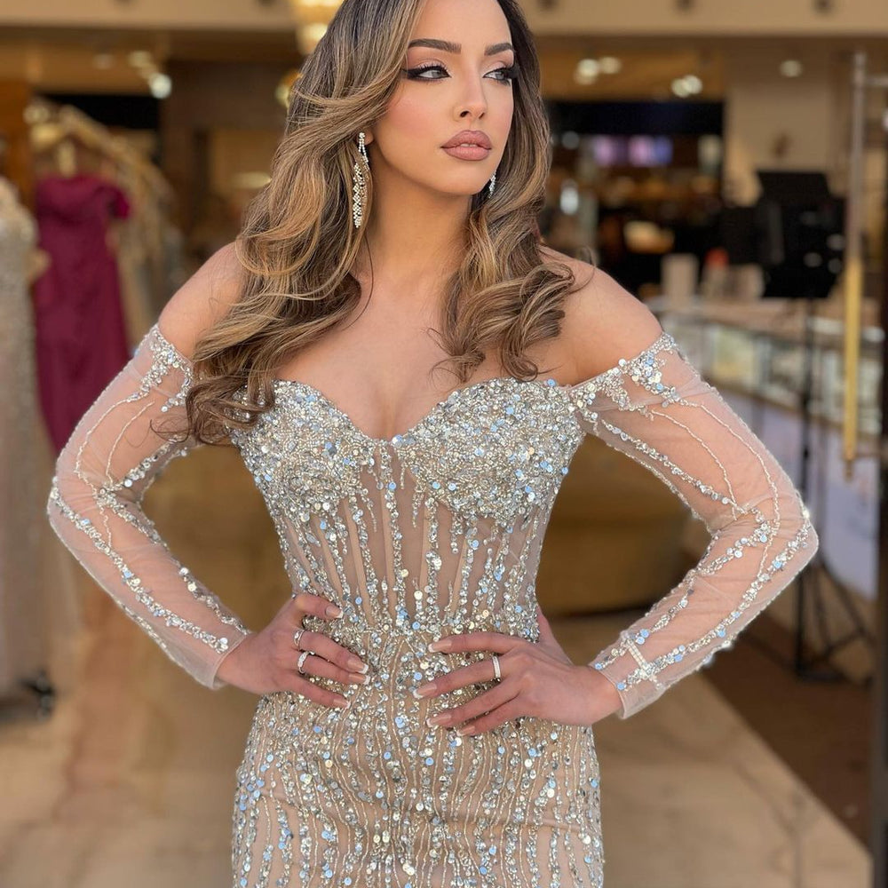 
                  
                    Heavy Sweetheart Prom Dress with Long Sleeves and Strapless Beadings
                  
                