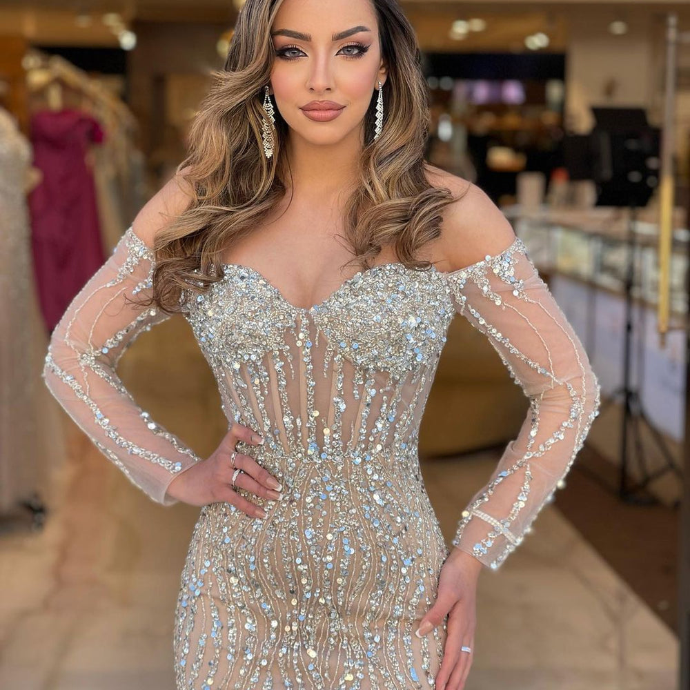 
                  
                    Heavy Sweetheart Prom Dress with Long Sleeves and Strapless Beadings
                  
                