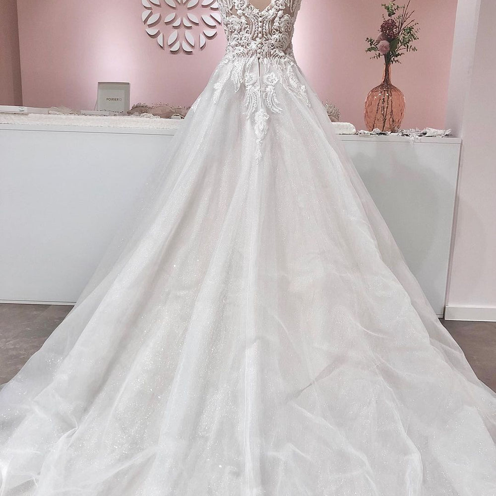 
                  
                    Long A-line V-neck Appliques Lace Backless Tulle Ruffles Wedding Dress-BIZTUNNEL
                  
                