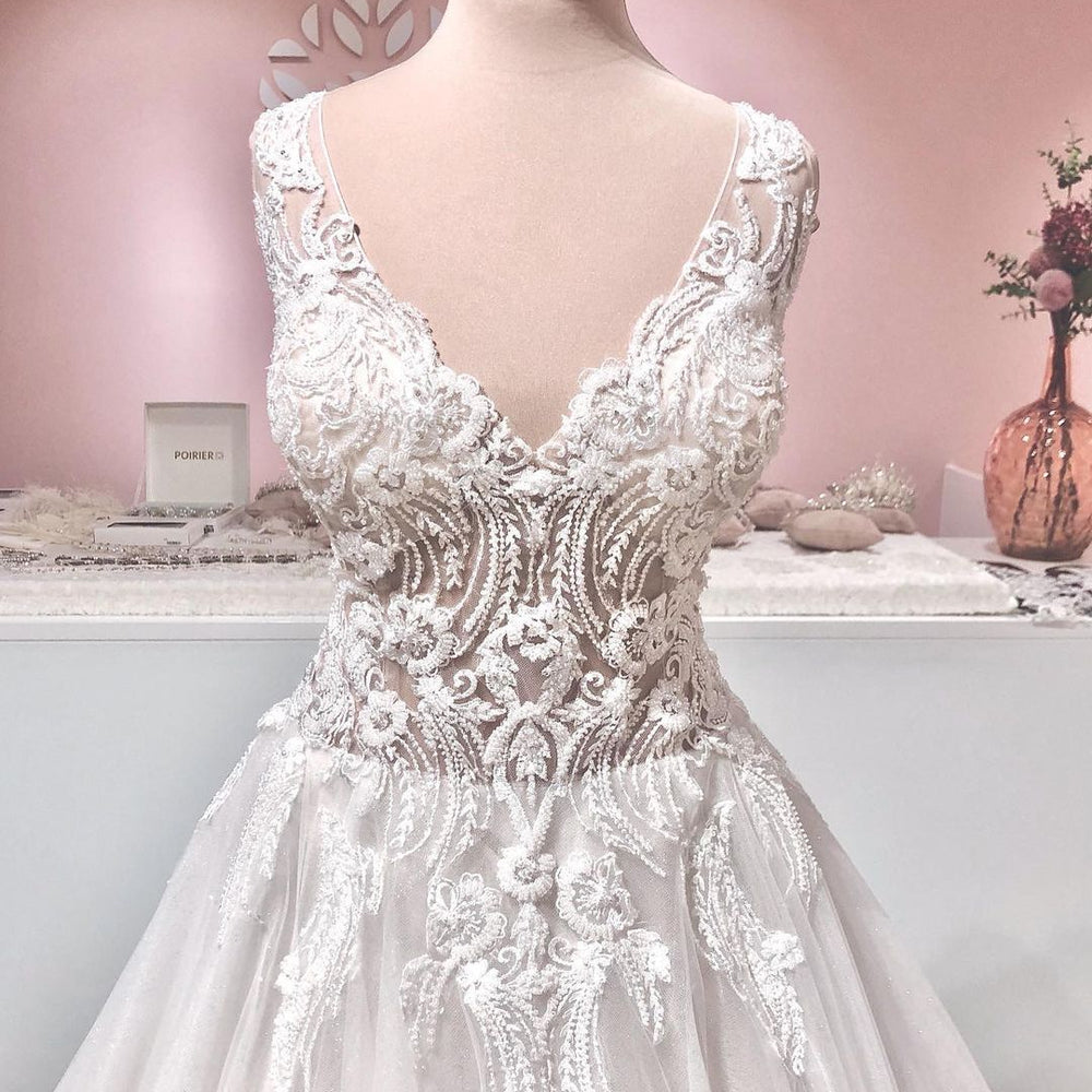 
                  
                    Long A-line V-neck Appliques Lace Backless Tulle Ruffles Wedding Dress-BIZTUNNEL
                  
                