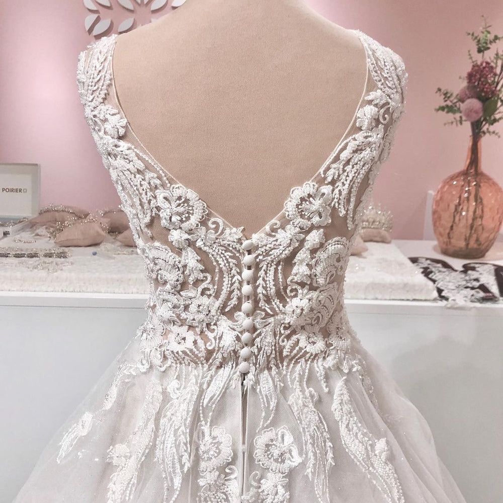 
                  
                    Long A-line V-neck Appliques Lace Backless Tulle Ruffles Wedding Dress-BIZTUNNEL
                  
                