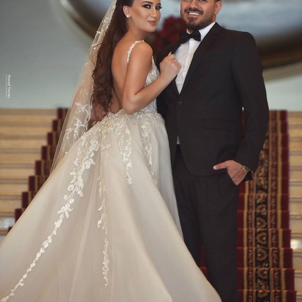 
                  
                    Long Mermaid V-neck Tulle Lace Wedding Dress with Detachable Train-BIZTUNNEL
                  
                