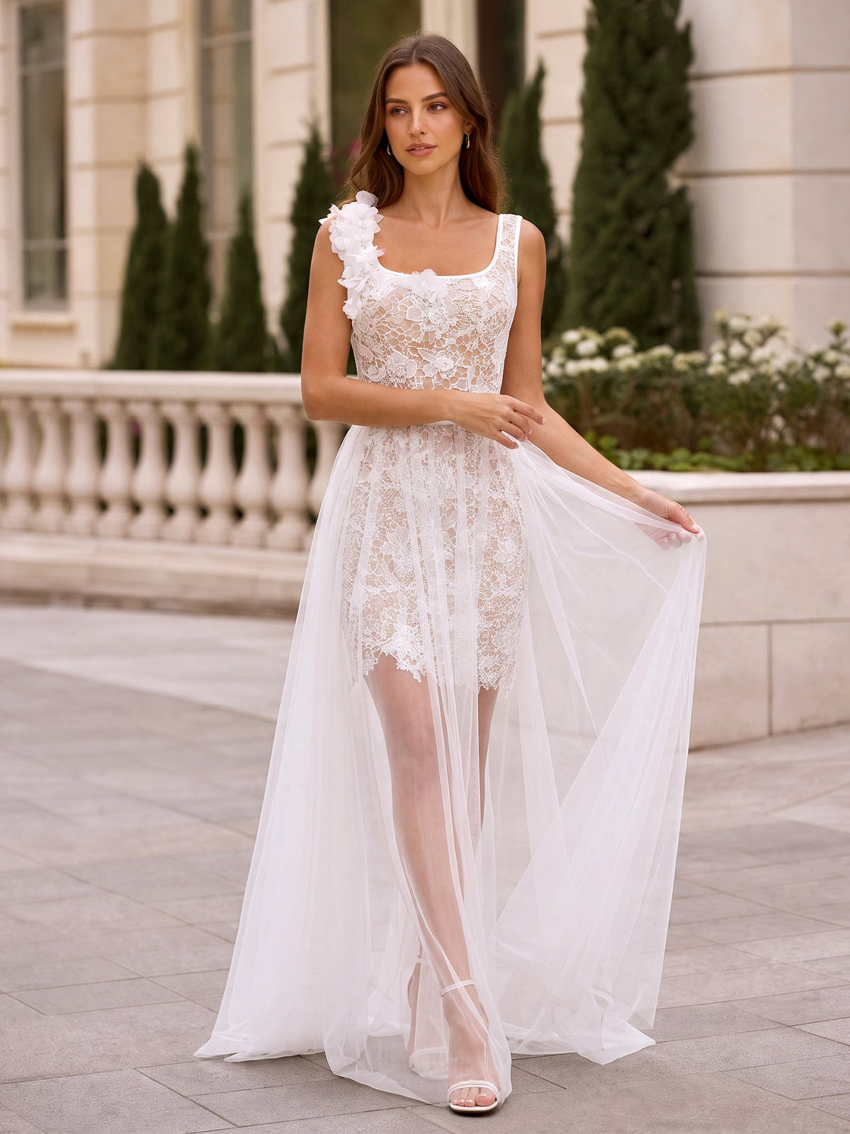 White floral lace floor-length gown with a square neckline and sheer tulle overlay, front view.