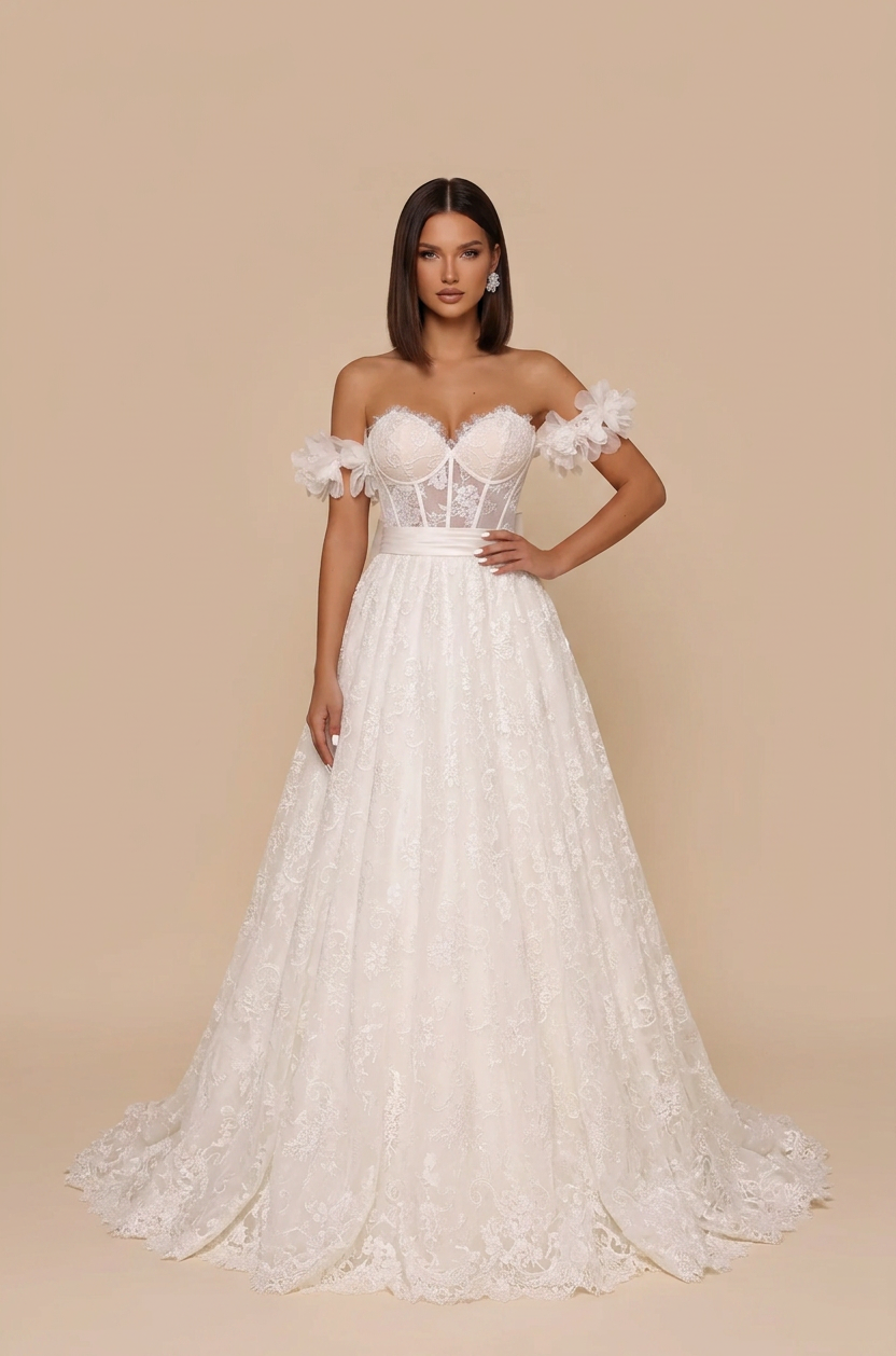 Front view of a white off-the-shoulder A-line wedding dress with a sweetheart lace bodice, sheer corset-style seaming, floral applique sleeve cuffs and a full floor-length lace skirt